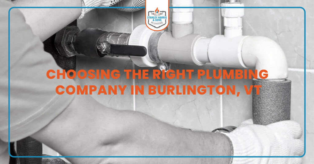 Professional plumber in Burlington, VT fixing kitchen sink with tools, representing reliable licensed plumbing services for homeowners.